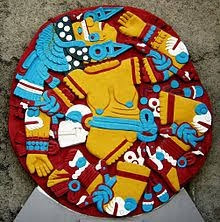 Coyolxauhqui being cut by Huitzilopochtli